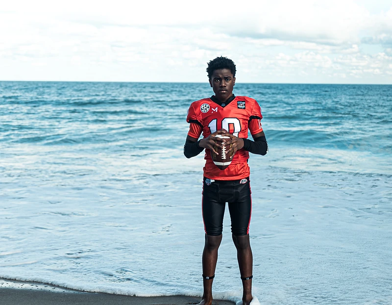High school football athlete during VISIONATL youth sports media coverage in Atlanta