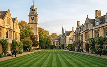 Stone-fronted school quad with striped lawn