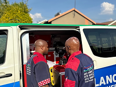 Guardian EMS paramedics providing care inside the ambulance