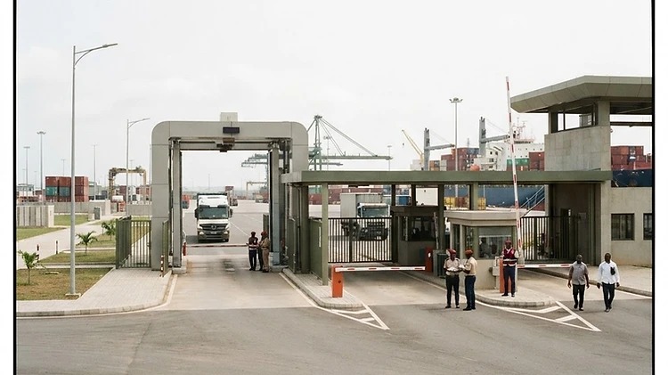 The industrial security gates and cargo screening equipment at the main entry point to the port of San-Pédro in Côte d'Ivoire.