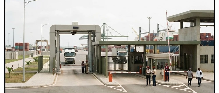 The industrial security gates and cargo screening equipment at the main entry point to the port of San-Pédro in Côte d'Ivoire.