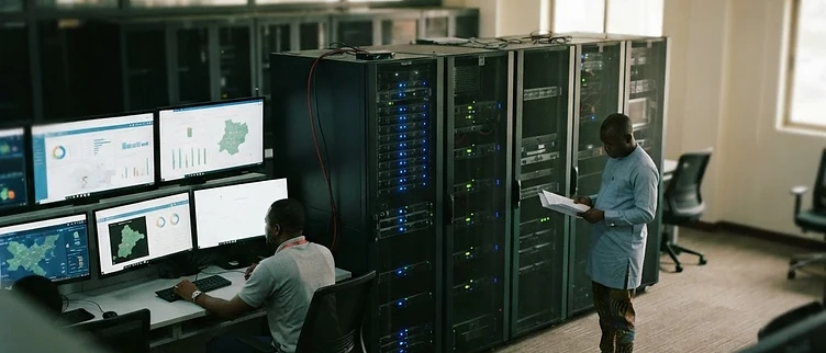 Illuminated digital monitoring screens and server cabinets fill the data command center at the Enugu State Government House in Enugu City.