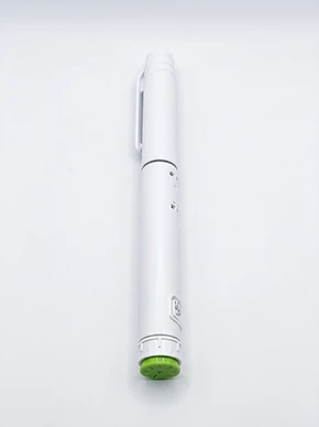 White peptide pen with green dial, showcasing the 40mg format
