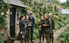 A parks team leader briefing a grounds team