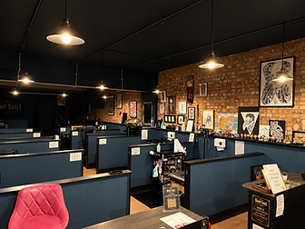 The calm, warmly lit interior of Good Soul Tattoo Studio in Birmingham