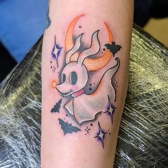 Neo-traditional colour tattoo of Zero the ghost dog with a glowing orange nose and red collar, set against an orange crescent moon with black bat silhouettes and purple stars