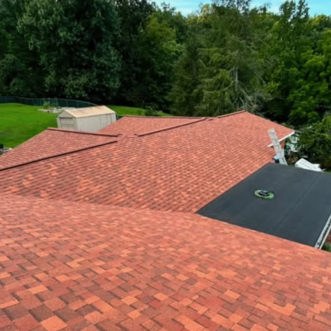 Aerial view of red architectural shingle roofing project