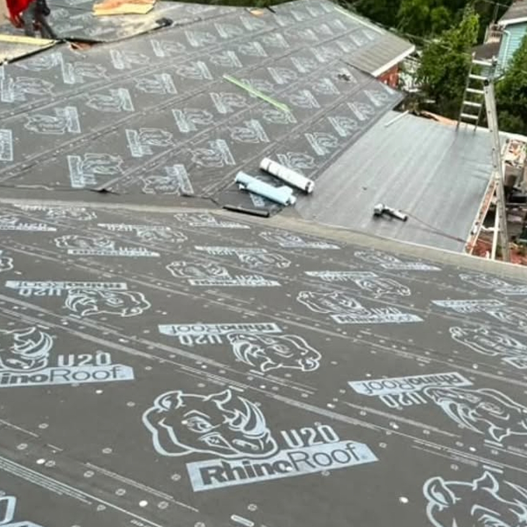 Roof deck covered with RhinoRoof U20 underlayment during installation