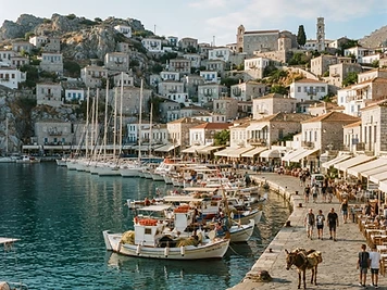 Stone captains' houses around the small harbour of Hydra Town.