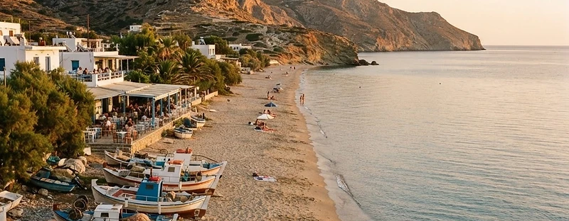 Fishing boats drawn up at the northern end of the long sandy beach at Kini, Syros.