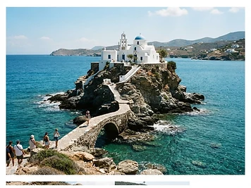 The whitewashed Chrysopigi monastery on its rocky promontory on Sifnos.