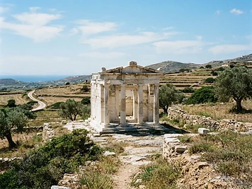 The partly reconstructed marble temple of Demeter among fields at Sangri, Naxos.