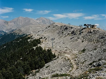 The limestone plateau of Mount Parnassos above the fir forest