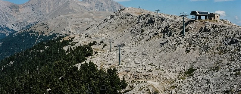 The limestone plateau of Mount Parnassos above the fir forest