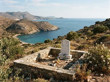 The white marble headstone of Rupert Brooke’s grave on the hillside above Tris Boukes bay on Skyros.