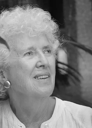 Linda Kohen smiling, black-and-white portrait
