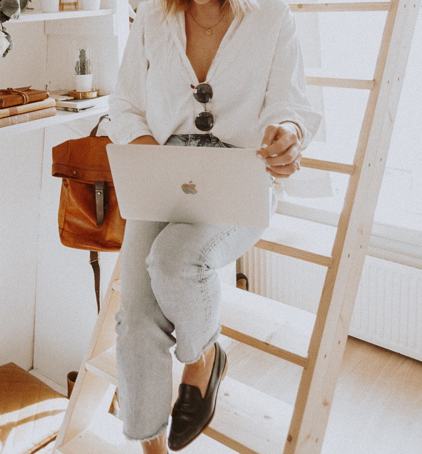 Female founder working on laptop