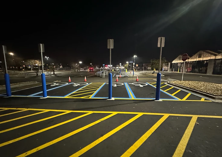 Stripe Kings pavement marking crew at work on a commercial lot