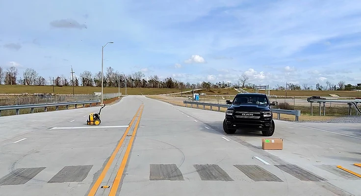 Pavement markings on a concrete roadway completed by Stripe Kings