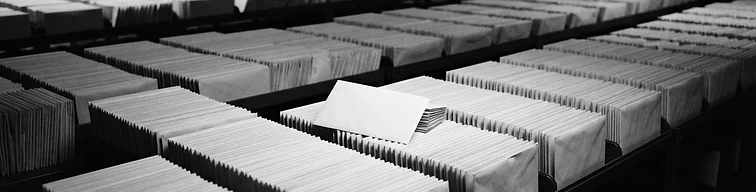 Stacked envelopes representing volume of consumer reviews