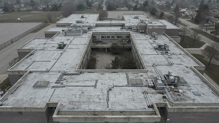 Aerial view of a school roof, desaturated