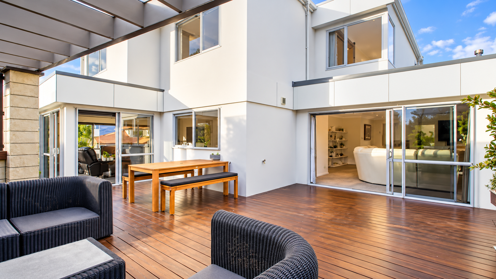 Sunlit Courtyard — Deck Dining Under Pergola