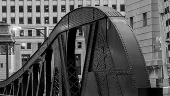 The riveted steel arch of the LaSalle Street Bridge in Chicago.