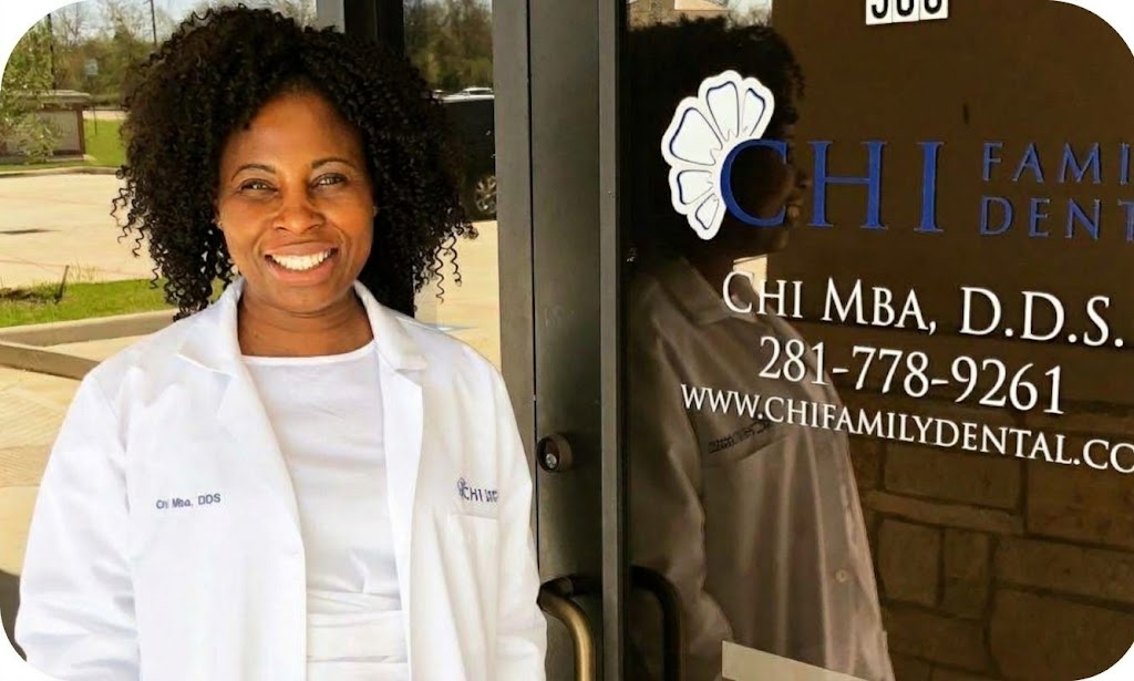 Dr. Chi Mba, DDS standing outside Chi Family Dental in Missouri City