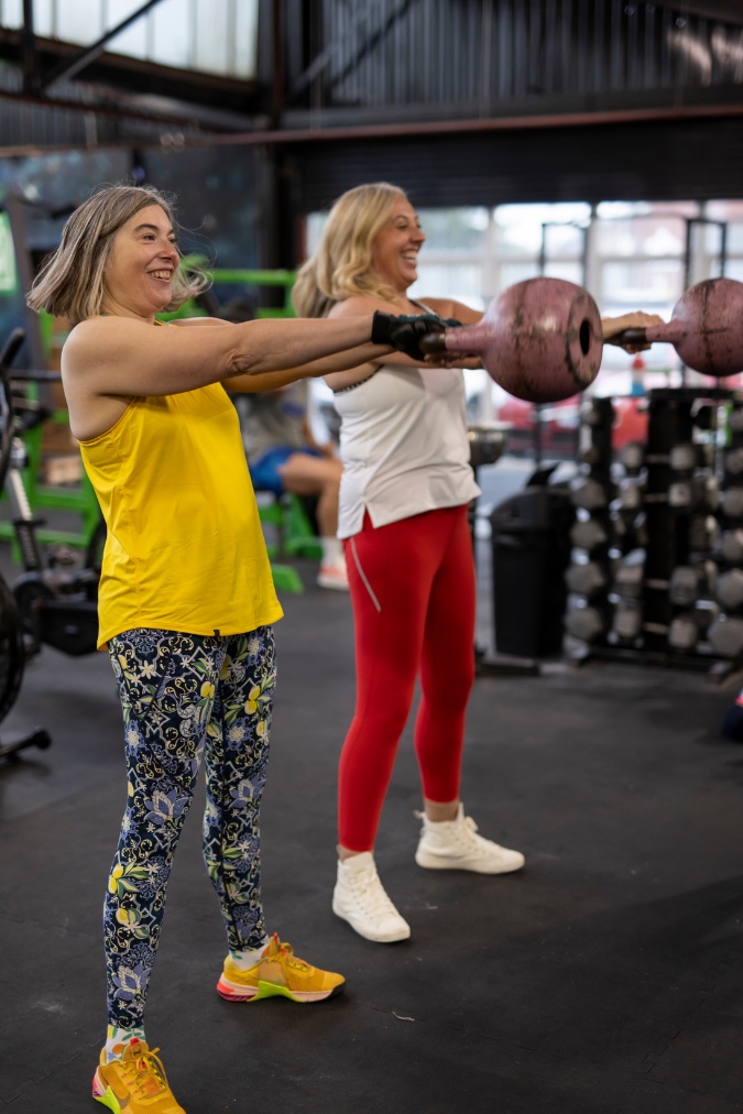 Woman in powerful fitness pose