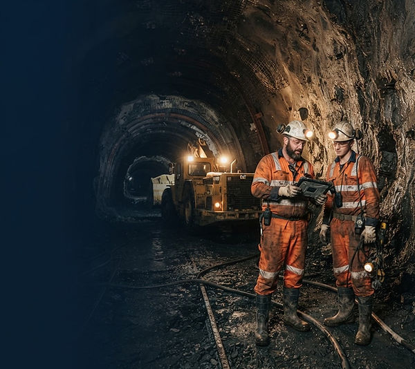 USC consultant working alongside a maintenance team in an underground mine