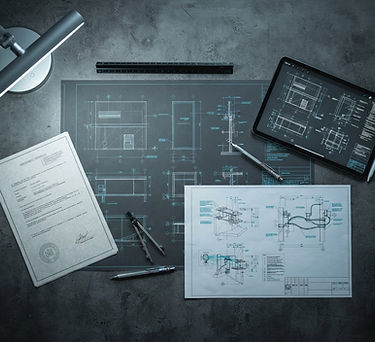 Architectural blueprints and permit documents on a dark desk