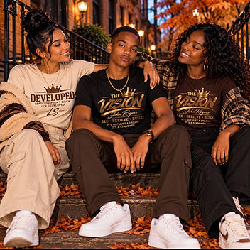 Three friends on a brownstone stoop in autumn wearing the Developed and The Vision tees — it's not just a dream, it's a standard