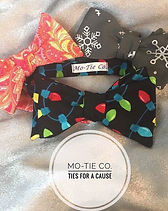 Mo-Tie Co. bow ties displayed on a silver background