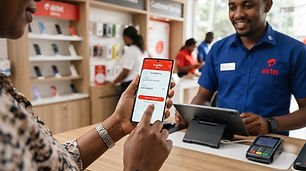Person using a smartphone for mobile money transfer in a modern setting