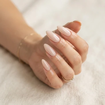 Milky nude acrylic nail extensions