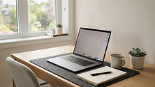 Modern and clean desk with a laptop, symbolizing responsible web data management in Quebec.