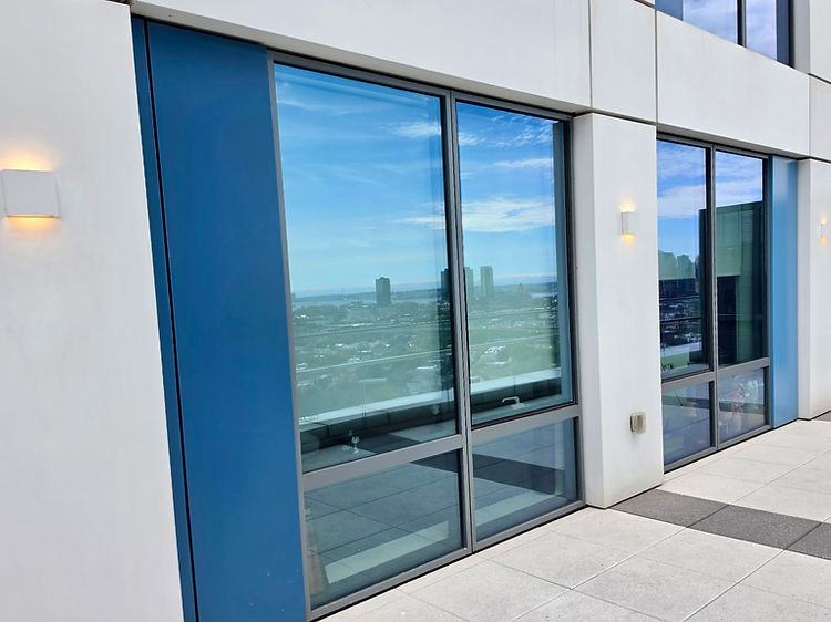 Modern commercial building facade with illuminated architectural lighting