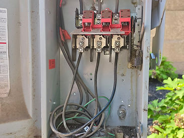 Outdoor fused disconnect enclosure for a trash compactor