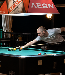 Guests playing pool inside the pub