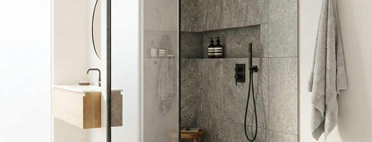 Modernes Badezimmer mit bodengleicher Dusche und großformatigen Fliesen