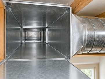 Professional air duct cleaning inside a residential home