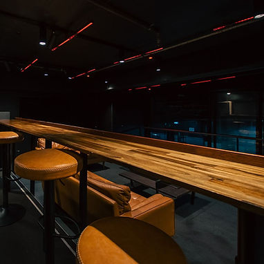 Opera Box timber bar overlooking the room