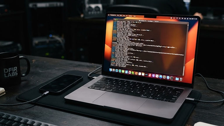 Forensic toolkit scanning a smartphone via USB on a laptop