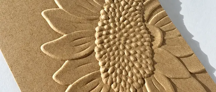 Kraft hang tags with raised sunflower decoration