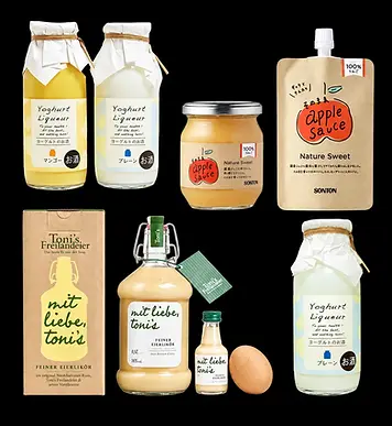 Glass jars and bottles with coordinated labels, wraps and paper cartons
