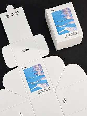 White printed paperboard folding cartons shown assembled and unfolded