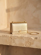 Bolso bandolera dorado