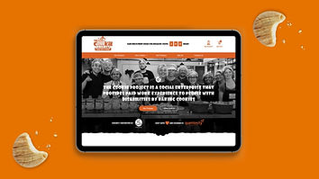 A tablet showing The Cookie Project online store against an orange brand backdrop.