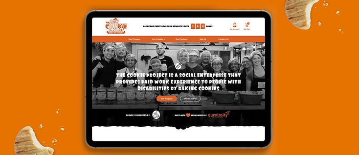 A tablet showing The Cookie Project online store against an orange brand backdrop.