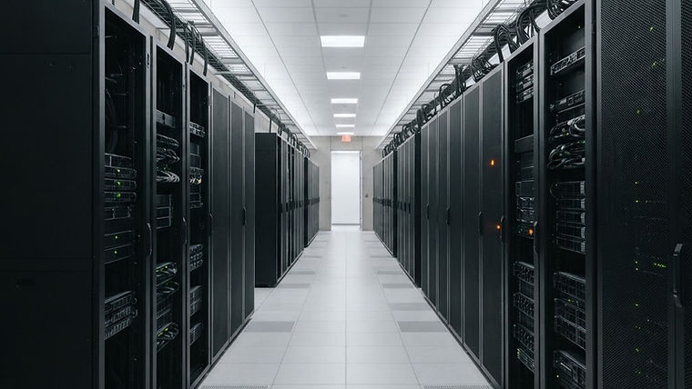 Data center aisle with symmetrical server racks under cool, calm lighting